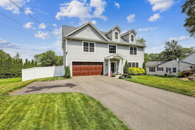 15 Wondy Way, Danbury, CT 06811 - view of front of property featuring a garage and asphalt driveway