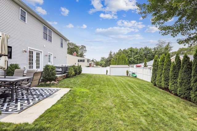 15 Wondy Way, Danbury, CT 06811 - fenced backyard featuring french doors and a patio
