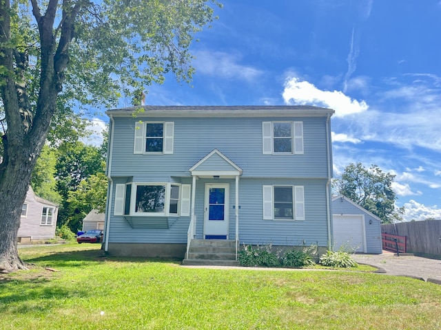 212 Clement Rd, East Hartford, CT 06118 - colonial home with entry steps, a garage, and an outbuilding