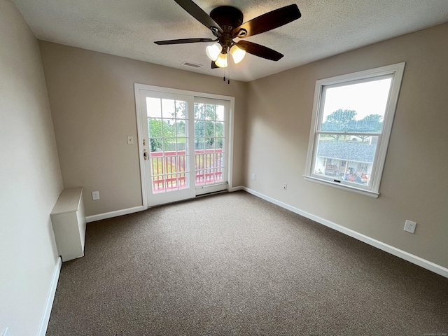 212 Clement Rd, East Hartford, CT 06118 - empty room featuring ceiling fan, carpet, and a textured ceiling