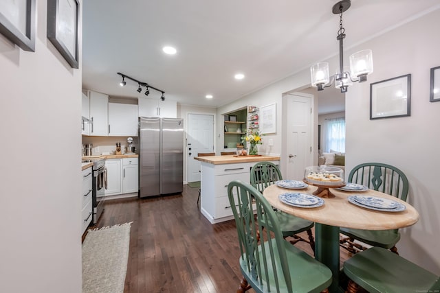 81 Burwell Rd, New Hartford, CT 06057 - dining space with dark wood-style floors, a chandelier, and recessed lighting