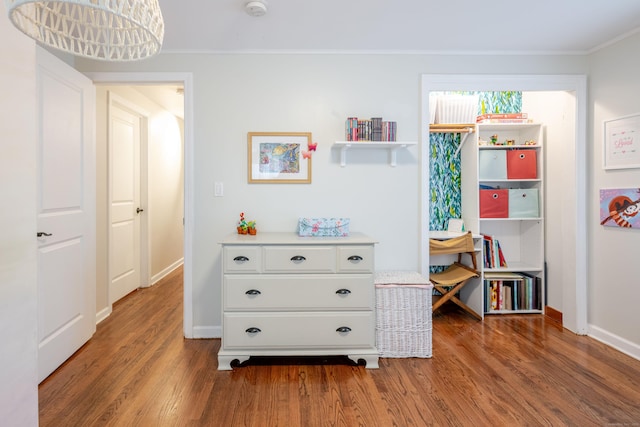 81 Burwell Rd, New Hartford, CT 06057 - bedroom featuring wood finished floors and crown molding