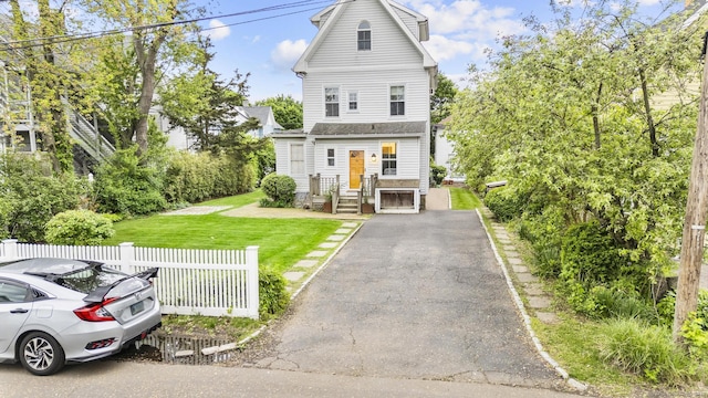 14 Jefferson St, Norwalk, CT 06851 - view of front facade featuring asphalt driveway