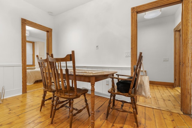 14 Jefferson St, Norwalk, CT 06851 - dining room with wood-type flooring and wainscoting