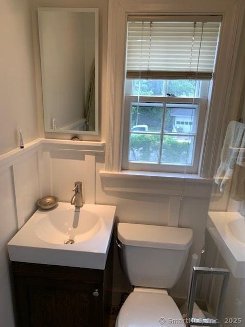 14 Jefferson St, Norwalk, CT 06851 - half bath featuring vanity and toilet
