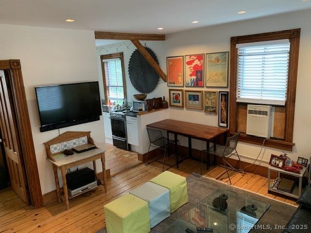 14 Jefferson St, Norwalk, CT 06851 - living area featuring light wood-type flooring, cooling unit, and recessed lighting