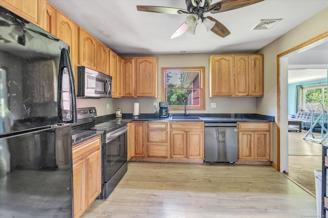3 Old Hemlock Rd, Brookfield, CT 06804 - kitchen with black appliances, light wood-style flooring, and a ceiling fan