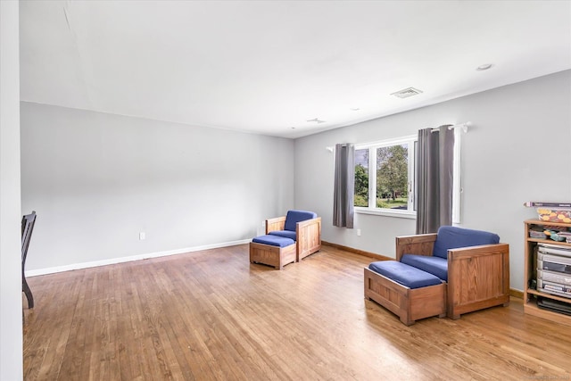 3 Old Hemlock Rd, Brookfield, CT 06804 - sitting room with light wood-style flooring and baseboards