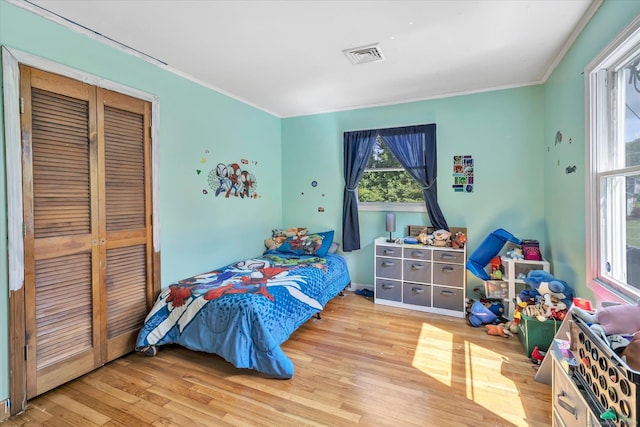 3 Old Hemlock Rd, Brookfield, CT 06804 - bedroom featuring wood finished floors, ornamental molding, and a closet