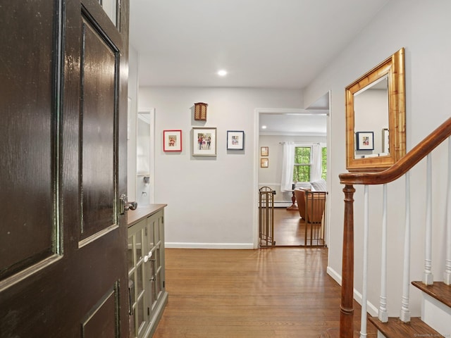 11 Dundee Rd, Stamford, CT 06903 - hallway with wood finished floors, stairway, and recessed lighting