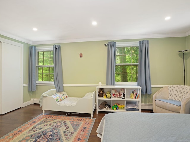 11 Dundee Rd, Stamford, CT 06903 - bedroom with baseboard heating, crown molding, wood finished floors, and recessed lighting
