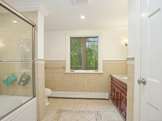 11 Dundee Rd, Stamford, CT 06903 - full bath featuring tile walls, a baseboard radiator, inlaid floor details, vanity, and wainscoting