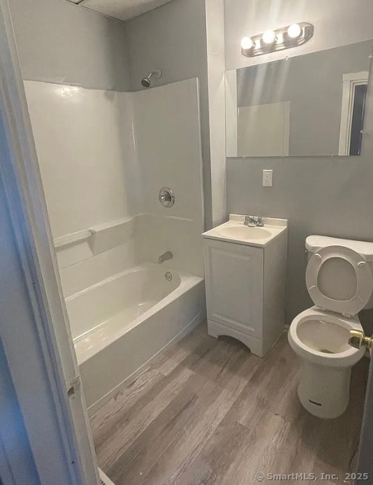 152 Brook St, Hartford, CT 06120 - full bath featuring wood finished floors, shower / tub combination, and vanity
