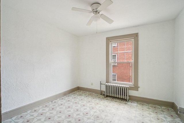 67 Whiting St, New Britain, CT 06051 - empty room featuring radiator heating unit, light floors, and a ceiling fan