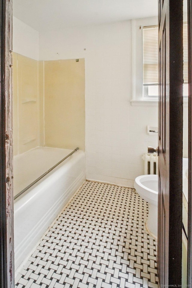 67 Whiting St, New Britain, CT 06051 - full bath featuring washtub / shower combination and radiator heating unit
