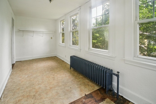 67 Whiting St, New Britain, CT 06051 - unfurnished sunroom with radiator