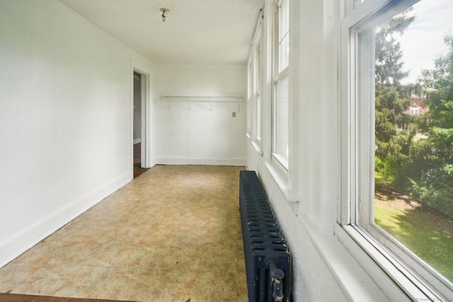 67 Whiting St, New Britain, CT 06051 - unfurnished sunroom with radiator heating unit