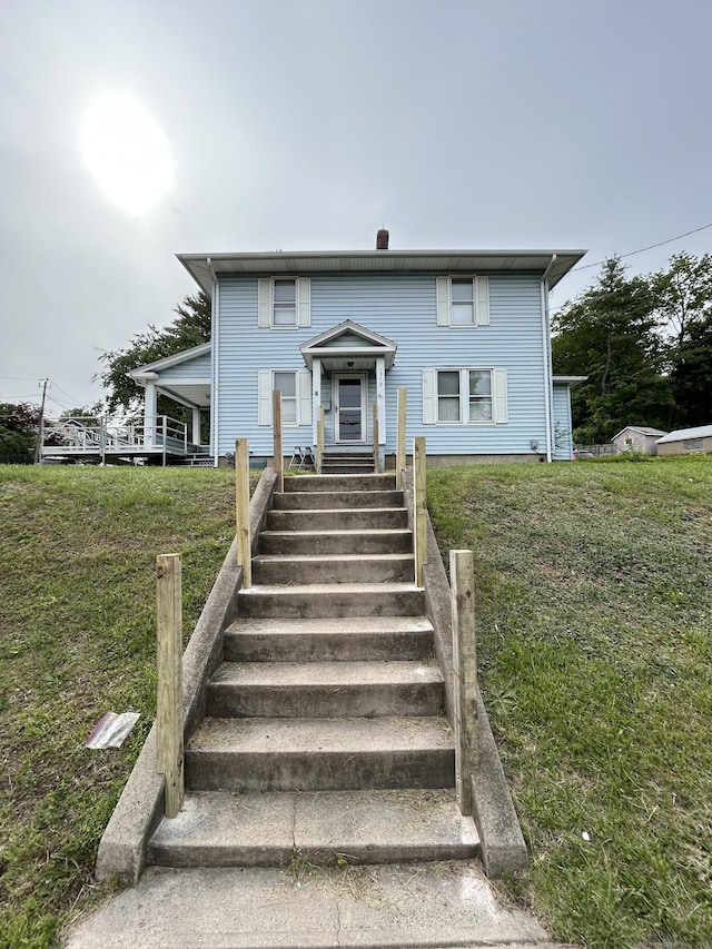 1318 Corbin Ave, New Britain, CT 06053 - view of front facade featuring a front yard
