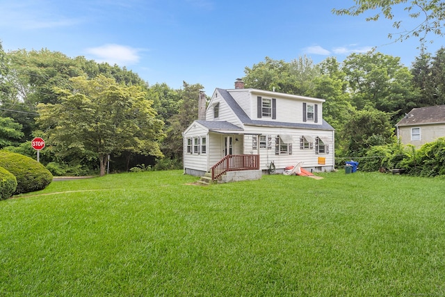 21 Harbor View Ave, Waterford, CT 06385 - view of front of home with a chimney and a front lawn