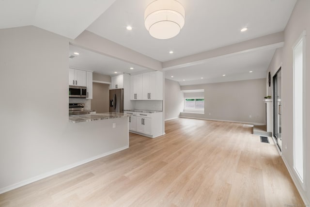 900 Heritage Vlg Unit B, Southbury, CT 06488 - unfurnished living room featuring light wood-style flooring and recessed lighting