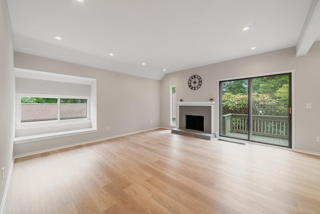 900 Heritage Vlg Unit B, Southbury, CT 06488 - unfurnished living room with light wood-type flooring, a fireplace, and recessed lighting