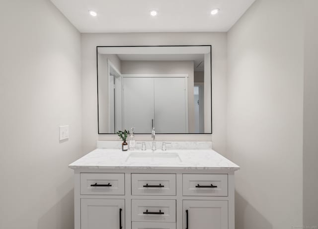 900 Heritage Vlg Unit B, Southbury, CT 06488 - bathroom with vanity and recessed lighting
