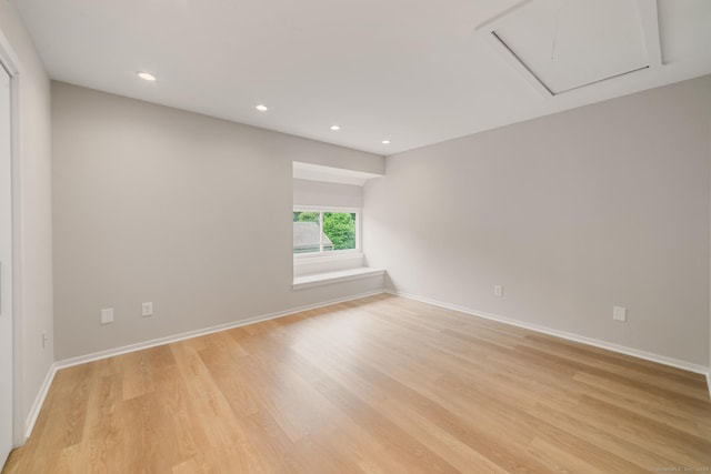 900 Heritage Vlg Unit B, Southbury, CT 06488 - spare room with attic access, light wood-style floors, and recessed lighting