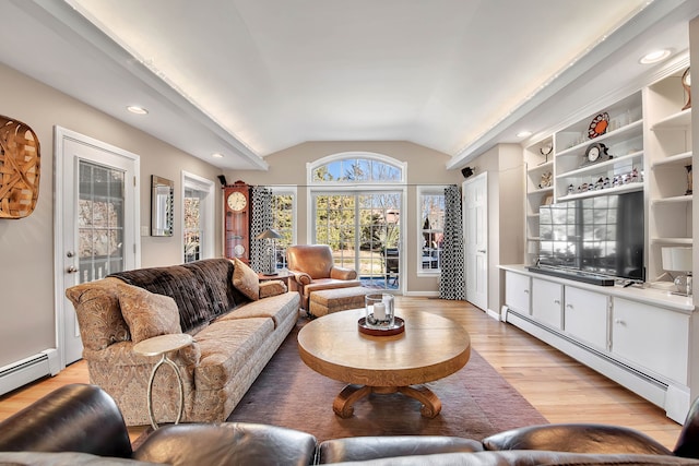 9 Anton Ln, Berlin, CT 06037 - living room featuring baseboard heating, light wood finished floors, vaulted ceiling, and recessed lighting
