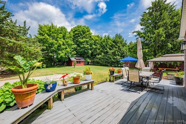 9 Anton Ln, Berlin, CT 06037 - deck with a lawn, a gazebo, outdoor dining area, and an outdoor structure