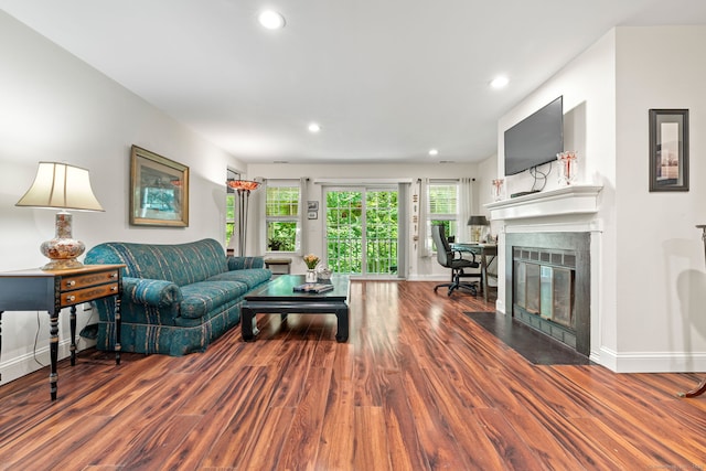 306 Hadley Dr Unit 306, Trumbull, CT 06611 - living room with wood finished floors, a fireplace with flush hearth, and recessed lighting