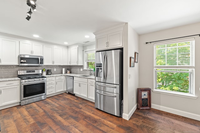 306 Hadley Dr Unit 306, Trumbull, CT 06611 - kitchen featuring stainless steel appliances, tasteful backsplash, dark wood-style floors, white cabinets, and recessed lighting