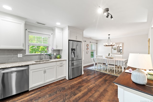 306 Hadley Dr Unit 306, Trumbull, CT 06611 - kitchen with appliances with stainless steel finishes, white cabinetry, decorative backsplash, dark wood-style floors, and recessed lighting