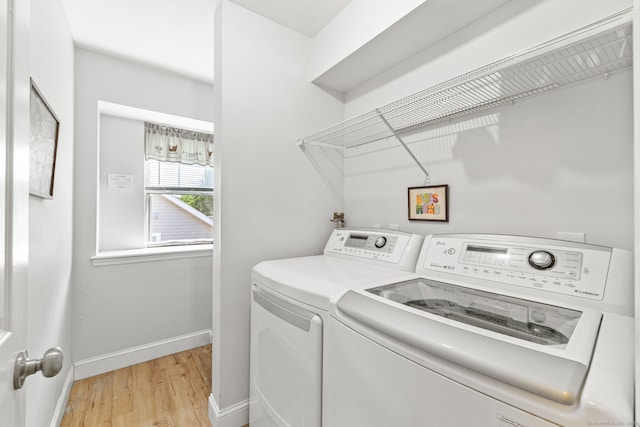 306 Hadley Dr Unit 306, Trumbull, CT 06611 - laundry area with washer and dryer and light wood finished floors