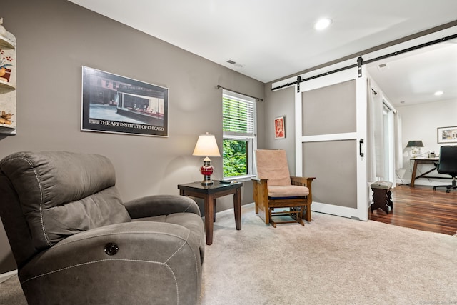 306 Hadley Dr Unit 306, Trumbull, CT 06611 - living area featuring a barn door, carpet, recessed lighting, and a desk