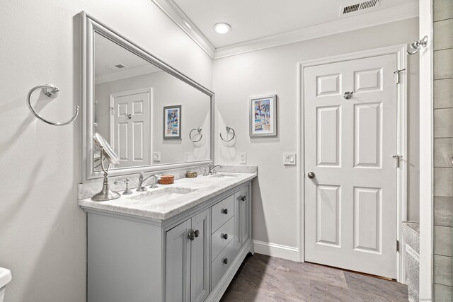 306 Hadley Dr Unit 306, Trumbull, CT 06611 - bathroom featuring ornamental molding and double vanity