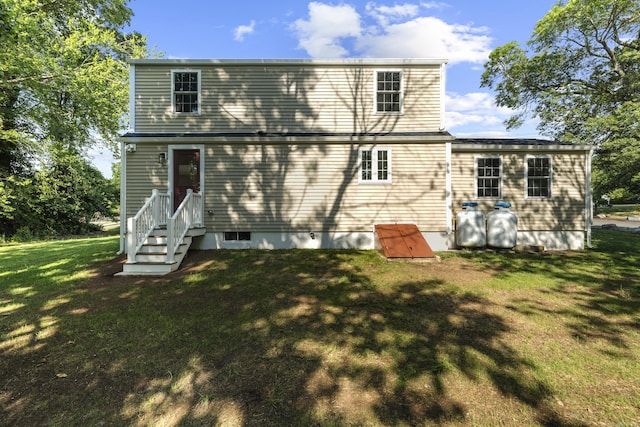 13 Brushy Plain Rd, Branford, CT 06405 - rear view of house featuring a lawn