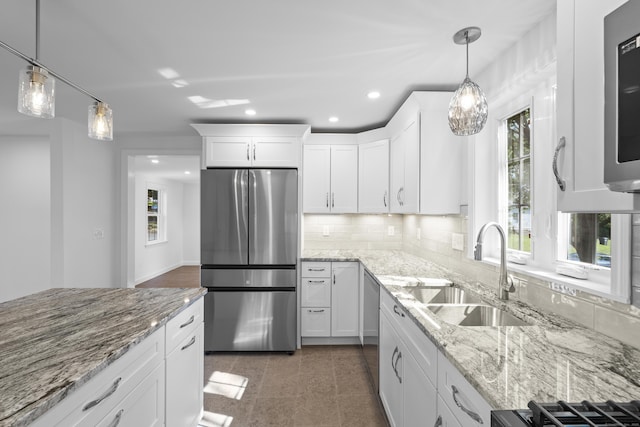 13 Brushy Plain Rd, Branford, CT 06405 - kitchen with appliances with stainless steel finishes, white cabinetry, recessed lighting, tasteful backsplash, and light stone countertops