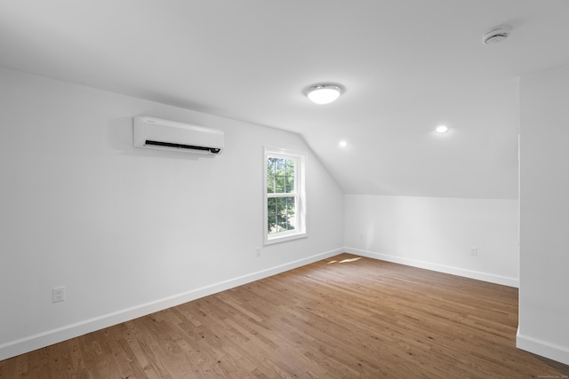 13 Brushy Plain Rd, Branford, CT 06405 - additional living space featuring a wall mounted AC, wood finished floors, lofted ceiling, and recessed lighting