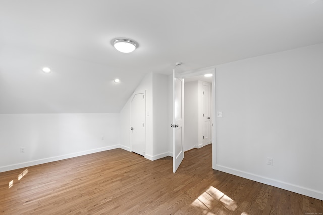 13 Brushy Plain Rd, Branford, CT 06405 - bonus room with wood finished floors, vaulted ceiling, and recessed lighting