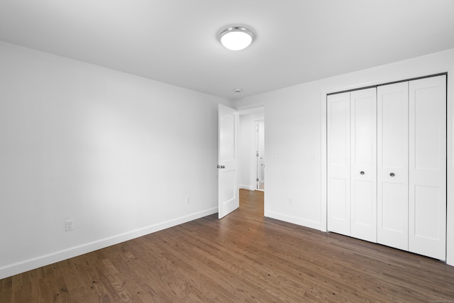 13 Brushy Plain Rd, Branford, CT 06405 - unfurnished bedroom featuring wood finished floors and a closet