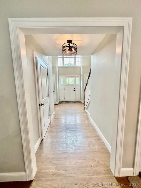 7 Pimlico Rd, Wolcott, CT 06716 - doorway with light wood-style flooring and stairs