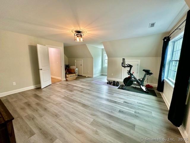 7 Pimlico Rd, Wolcott, CT 06716 - workout room with lofted ceiling and light wood finished floors