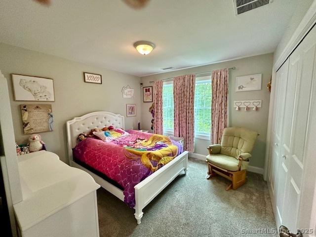7 Pimlico Rd, Wolcott, CT 06716 - carpeted bedroom featuring a closet and baseboards