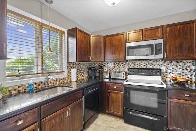 827 Oronoke Rd Apt 5-6, Waterbury, CT 06708 - kitchen with black appliances, decorative backsplash, and hanging light fixtures
