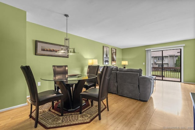 827 Oronoke Rd Apt 5-6, Waterbury, CT 06708 - dining area featuring wood finished floors and baseboards