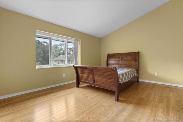 827 Oronoke Rd Apt 5-6, Waterbury, CT 06708 - bedroom with light wood-type flooring and lofted ceiling