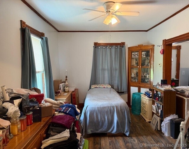 72 Stewart St, Bristol, CT 06010 - bedroom with wood finished floors, crown molding, and a ceiling fan