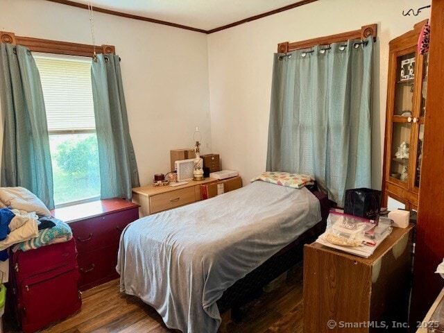 72 Stewart St, Bristol, CT 06010 - bedroom featuring crown molding and wood finished floors