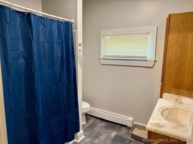 72 Stewart St, Bristol, CT 06010 - bathroom with a baseboard heating unit, vanity, a shower with curtain, and wood finished floors