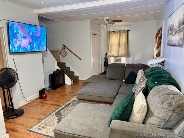 72 Stewart St, Bristol, CT 06010 - living area with wood finished floors, stairway, and a ceiling fan